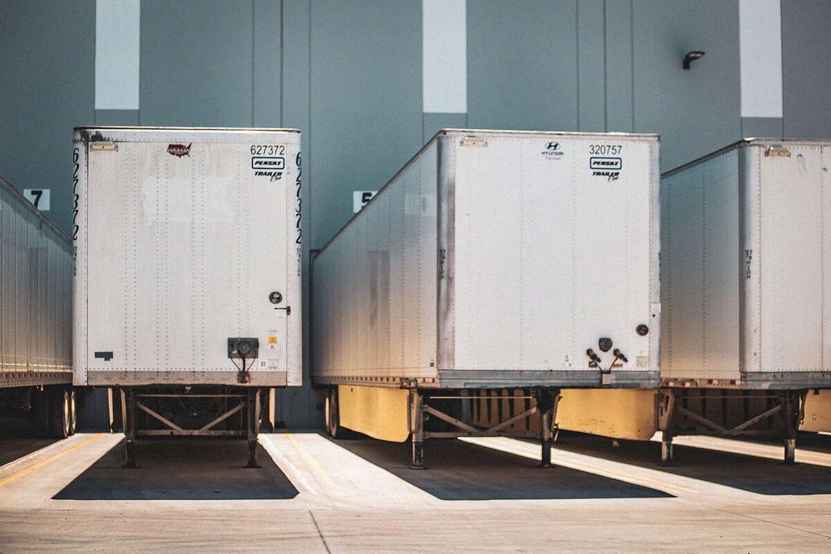 Security officer checking a trailer at an Orlando warehouse loading dock